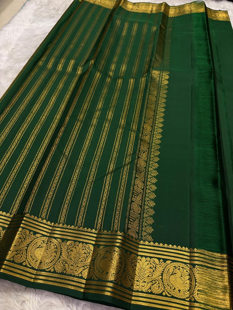Kanjivaram silk saree folded view green and gold combination