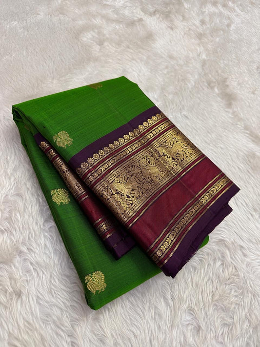grass green kanchipuram silk saree with pavun butta and korvai border folded view