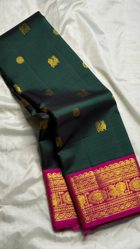 Kancheepuram silk saree green body with magenta border detail