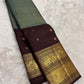 Kanjivaram silk saree green check pattern with traditional gold zari detail