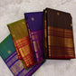 Green Kanjeevaram silk saree with mayil motifs and gold zari kattam border closeup detail