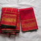 Red Kanjeevaram silk saree with zari kattam and peacock butta pattern close detail view