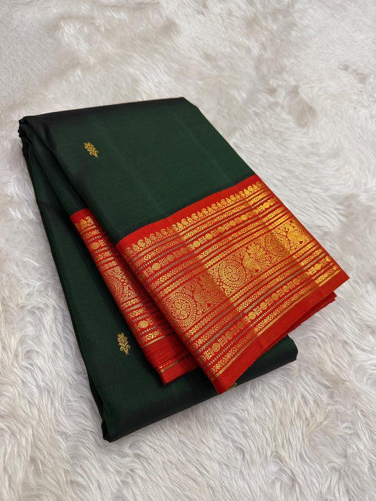 Green Kanjivaram silk saree with varisaipet korvai border and red contrast draped view