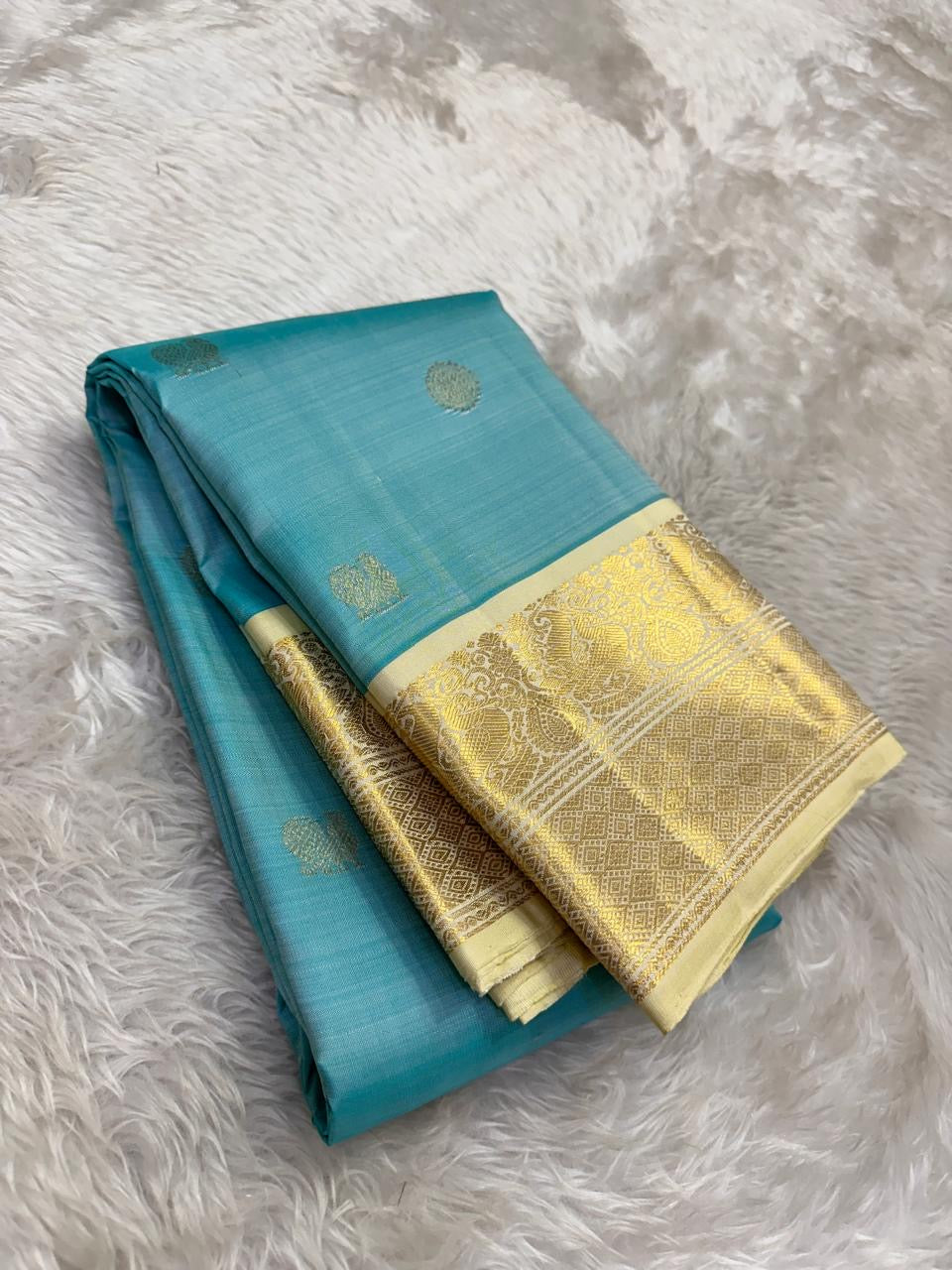 sky blue Kanchipuram silk saree with kv-myb weave folded view
