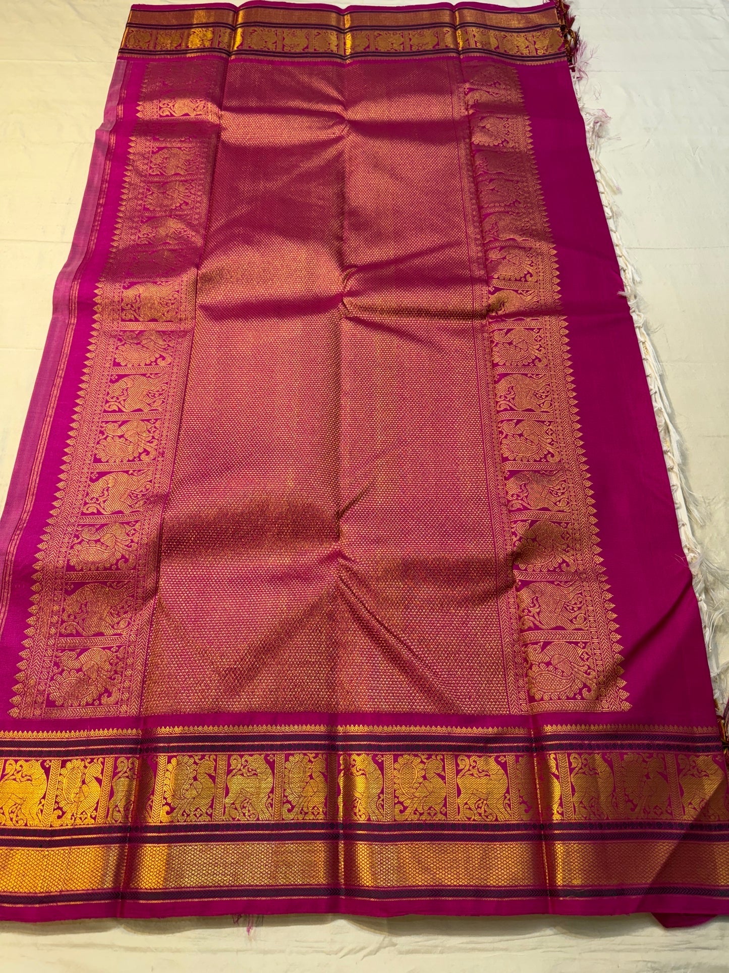 traditional tested zari detail on ivory Kanchipuram silk saree