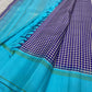 Kanjivaram silk saree aqua blue body with kanchi kattam indigo check pallu folded view
