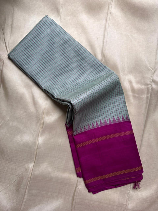 Kancheepuram silk saree blue checkered body with berry magenta pallu detail