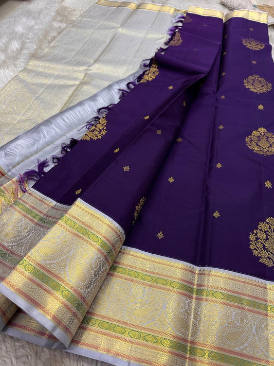 Semi draped purple lavender Kanchipuram silk saree highlighting zari woven detailing
