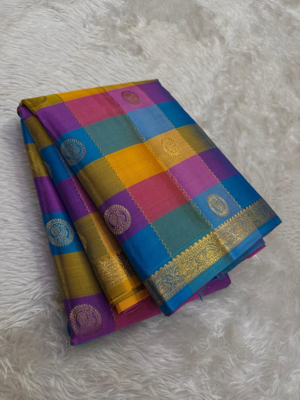 Kanjivaram silk saree paalum pazhamum weave yellow blue pink pallu detail