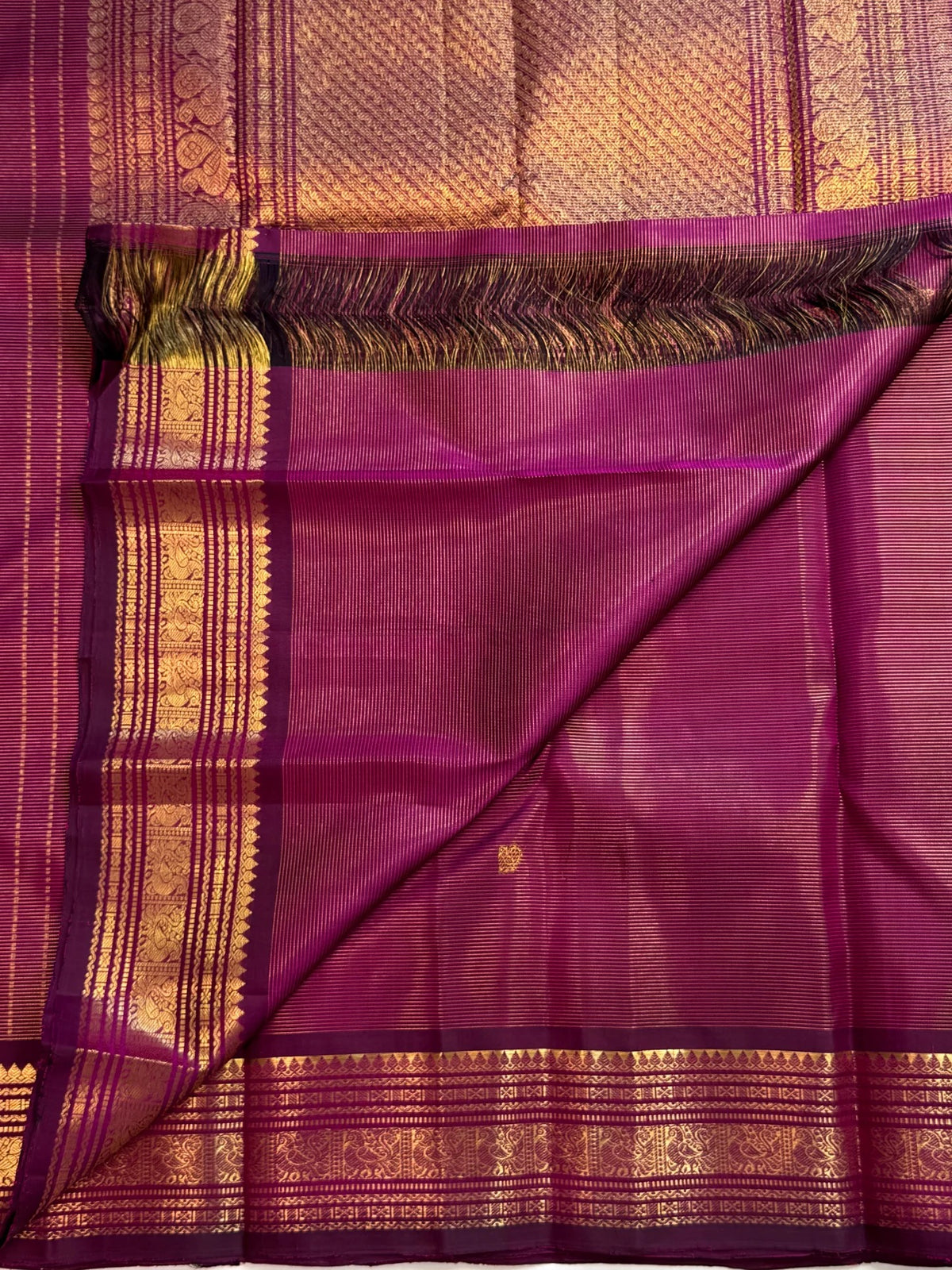 Vadamalli purple Vairaoosi Kanchipuram saree with fine zari lines and gold buttas