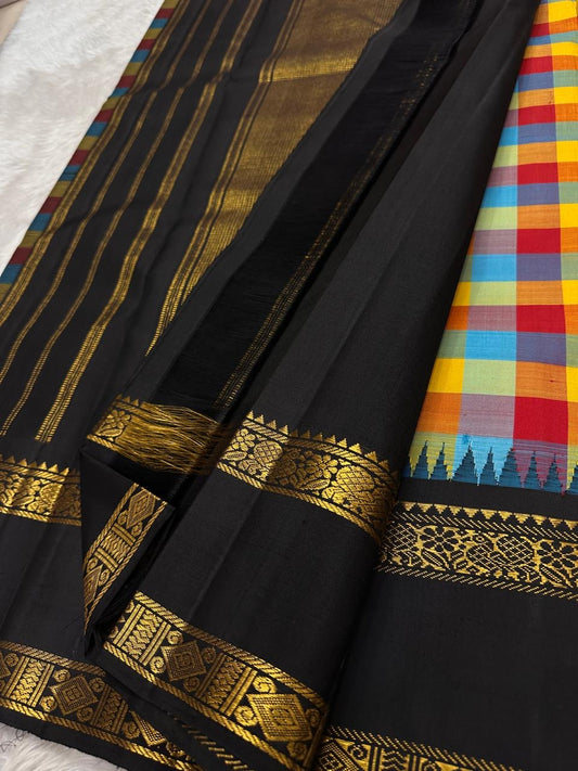 pastel multicolor kanjivaram silk saree checked pattern black border draped look