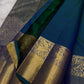 Blue Kanjeevaram silk saree with floral zari jaal pattern closeup detail