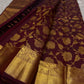 Brown Kanchipattu silk saree with floral butta jaal design folded display view