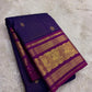 Green Kanjivaram silk saree with mayil motifs and zari kattam border draped view