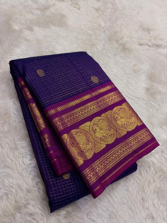 Green Kanjivaram silk saree with mayil motifs and zari kattam border draped view