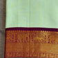 Pastel Kanchipuram silk saree folded view with vairaoosi zari lines and soft luminous weave