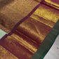 Soft pastel Kanjivaram saree draped view showing delicate vairaoosi zari shimmer across silk