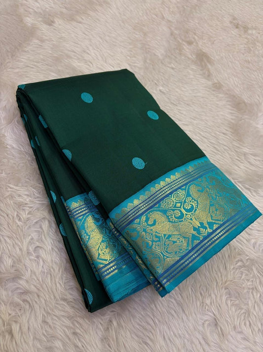deep green Kanchipuram silk saree with pb weave folded view
