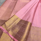 Pink Kanchipuram pattu saree border detailing with zari butta pattern