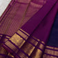 Green silk Kanchipuram saree with mayil motifs and zari kattam border pallu detail view