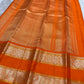 traditional tested zari detail on amber flame Kanchipuram silk saree