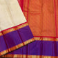 Close view of ivory body with zari stripes and contrast purple border beside orange zari woven pallu
