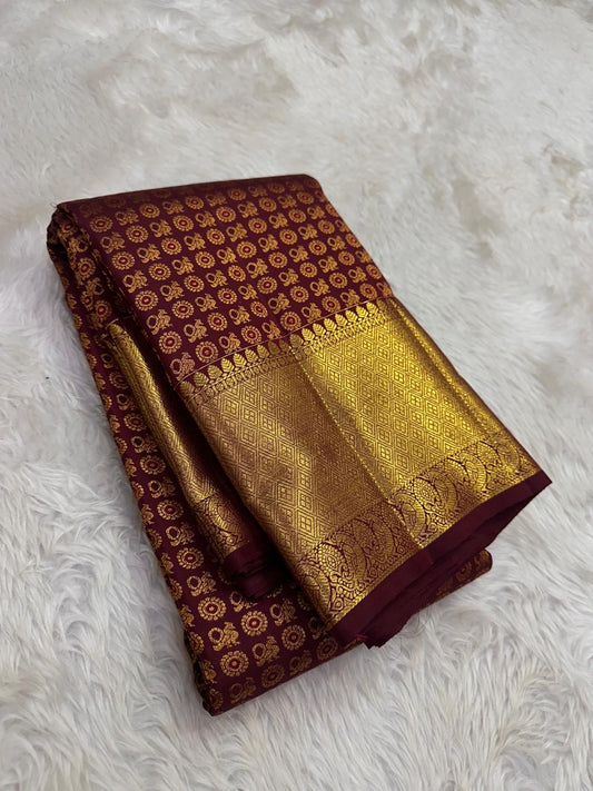 royal burgundy kanchipuram silk saree with mayil butta gold zari folded view