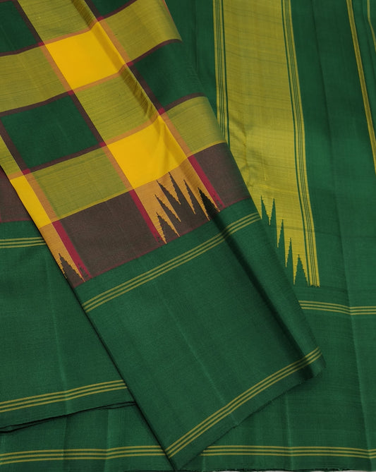 Green kanjivaram silk saree with yellow checkered pattern detail