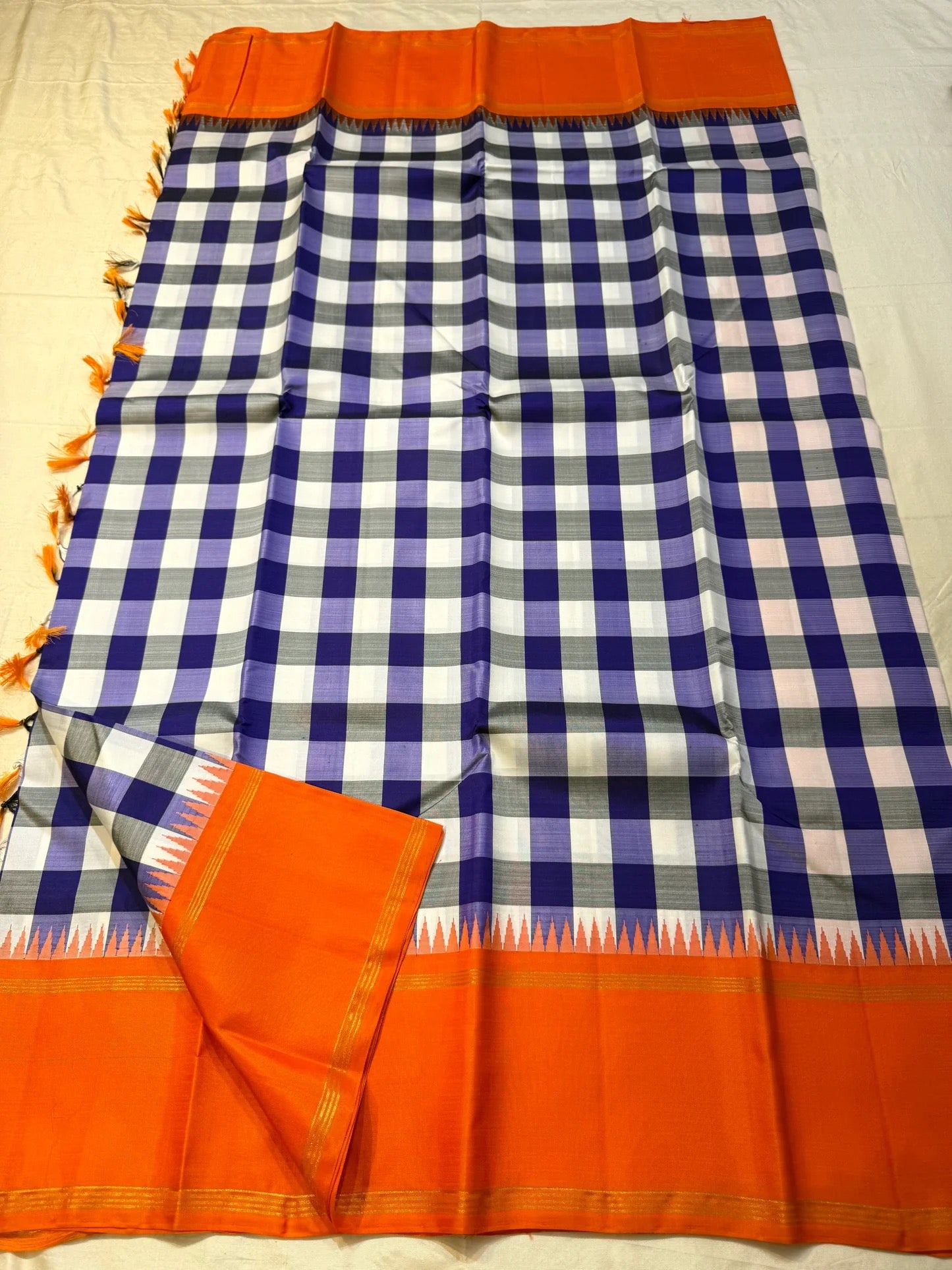 traditional tested zari detail on navy blue Kanchipuram silk saree