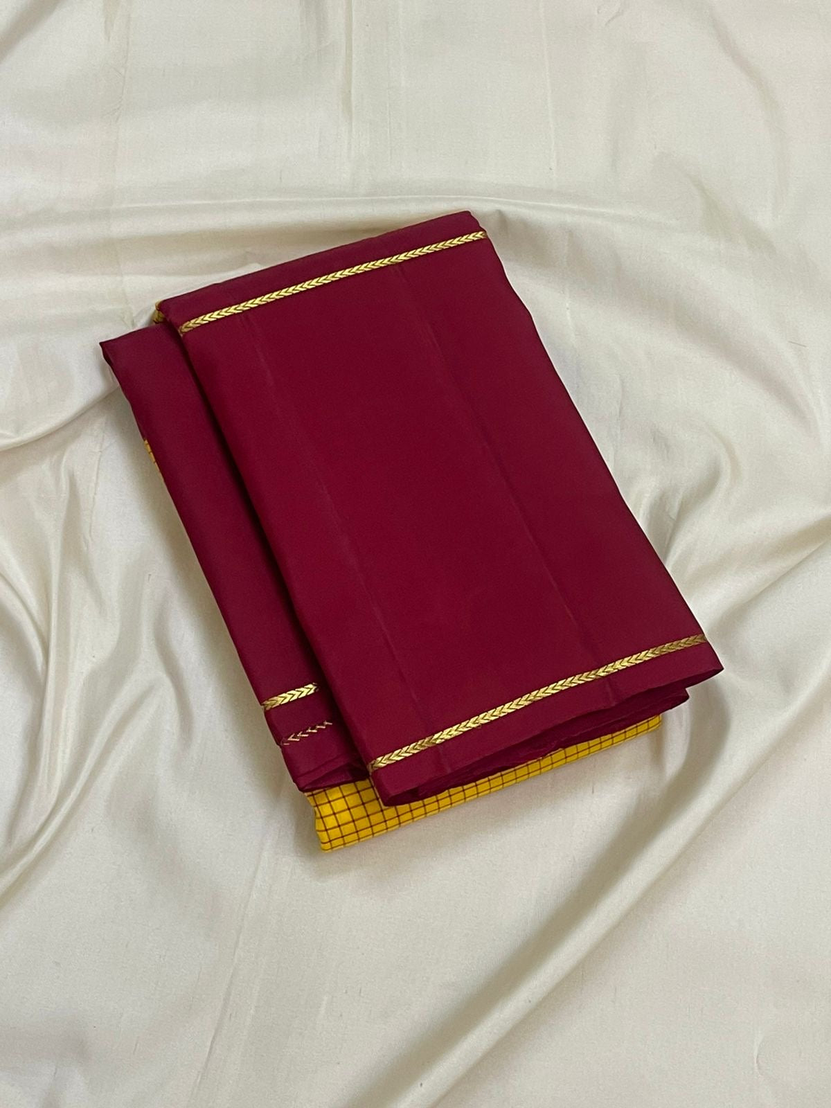 Kanjivaram silk saree yellow grid pattern with red rettapet border detail