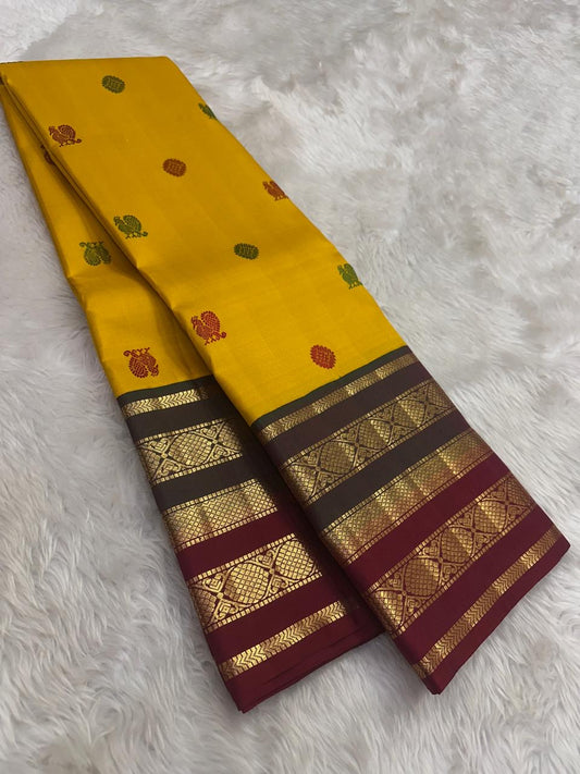 Pure Kanchipuram Silk Saree – Ochre Yellow with Silk Thread Butta and Zari Woven Border