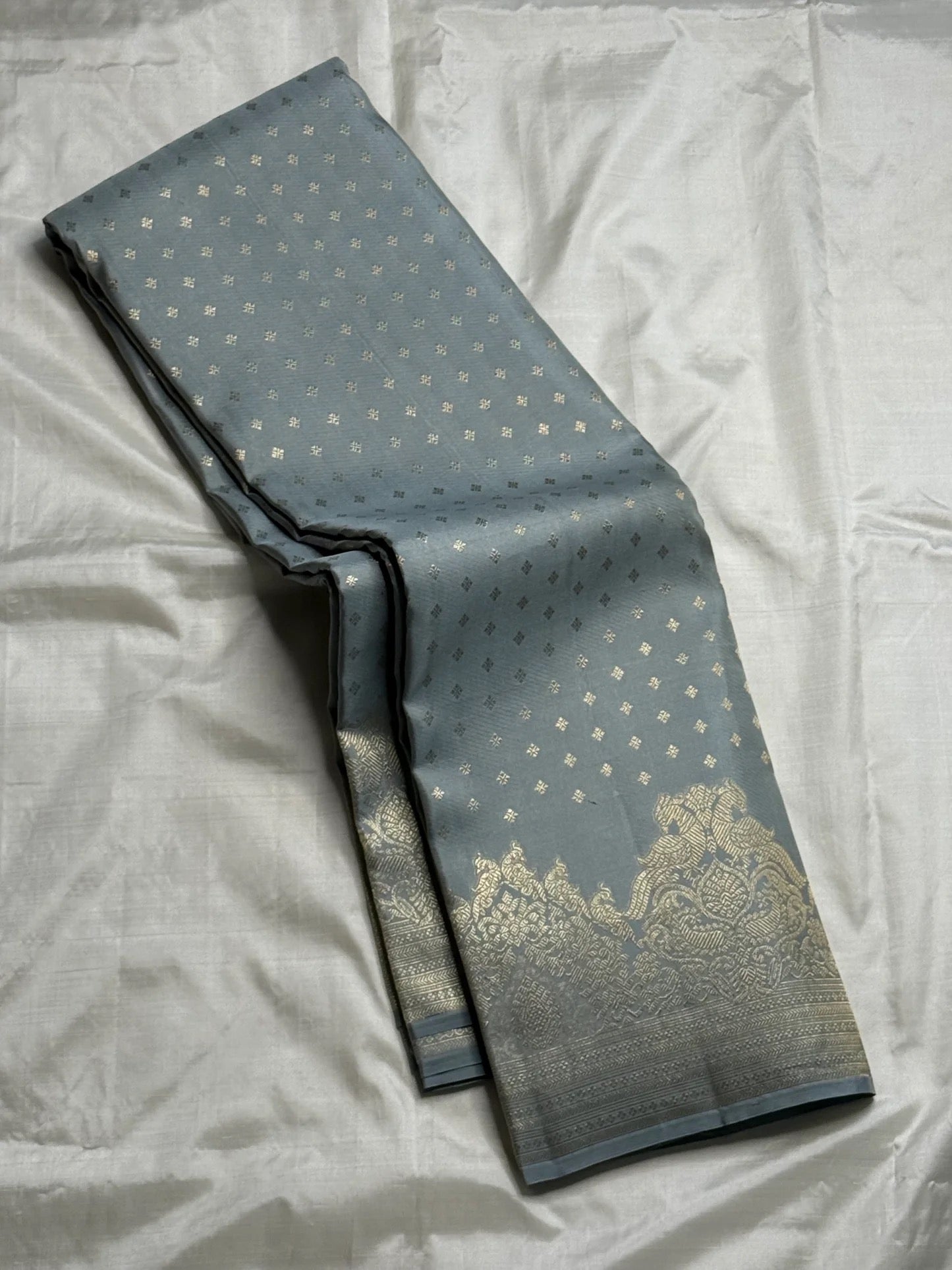 traditional tested zari detail on slate blue Kanchipuram silk saree
