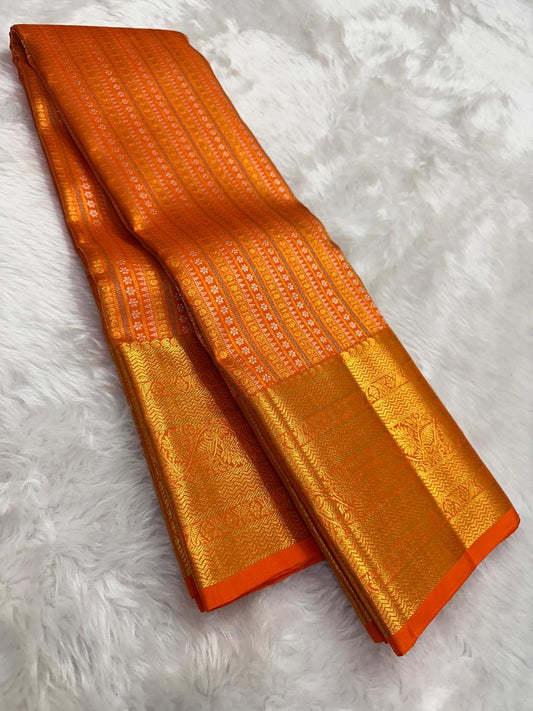 Kanchipuram silk saree tangerine orange with mayil butta folded view