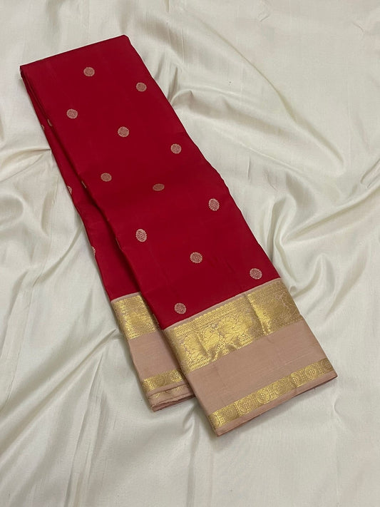 Kanjivaram silk saree red with pink beige rettapet border and gold detailing