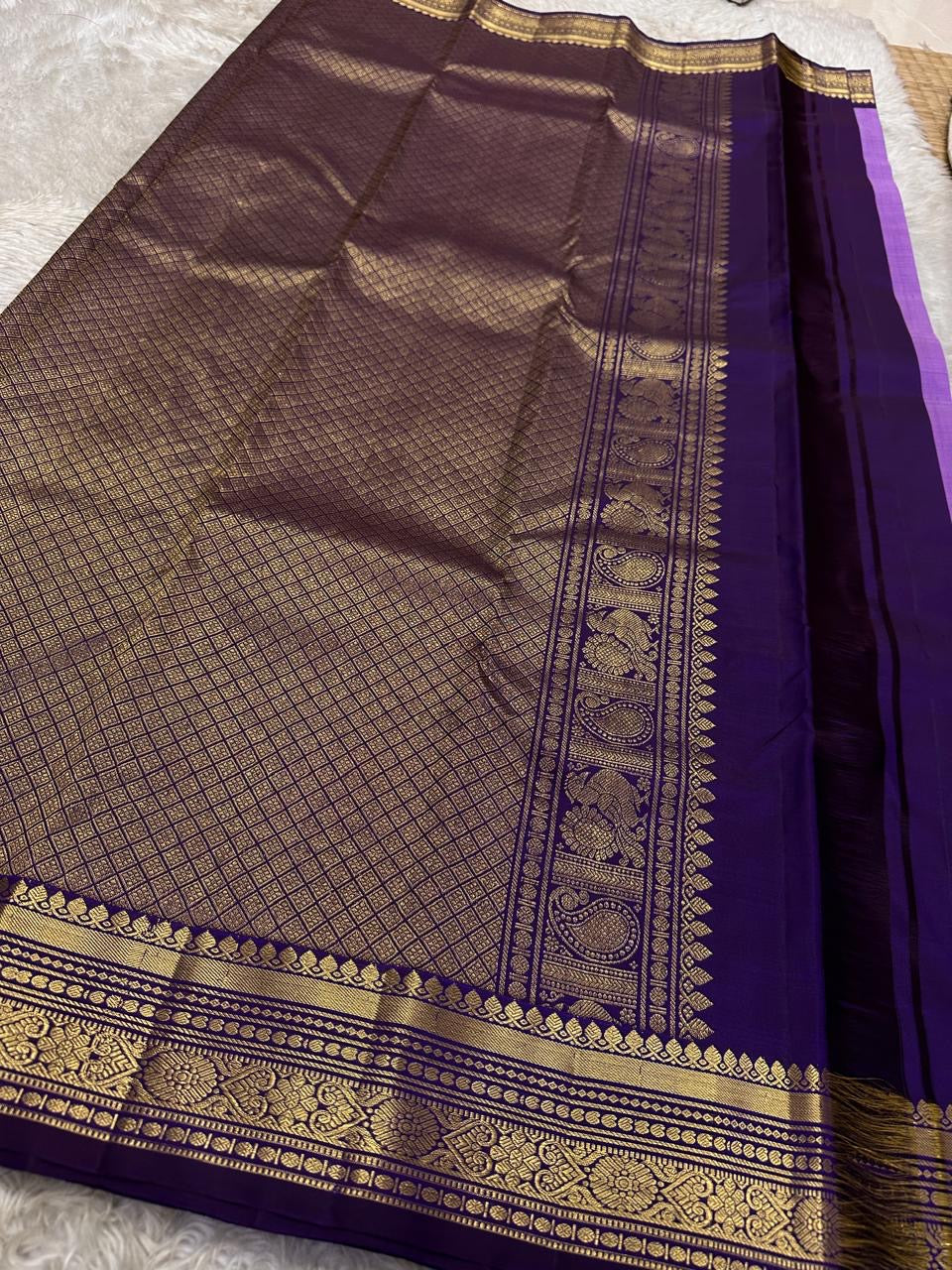 violet border detail of burnt copper Kanchipuram silk saree