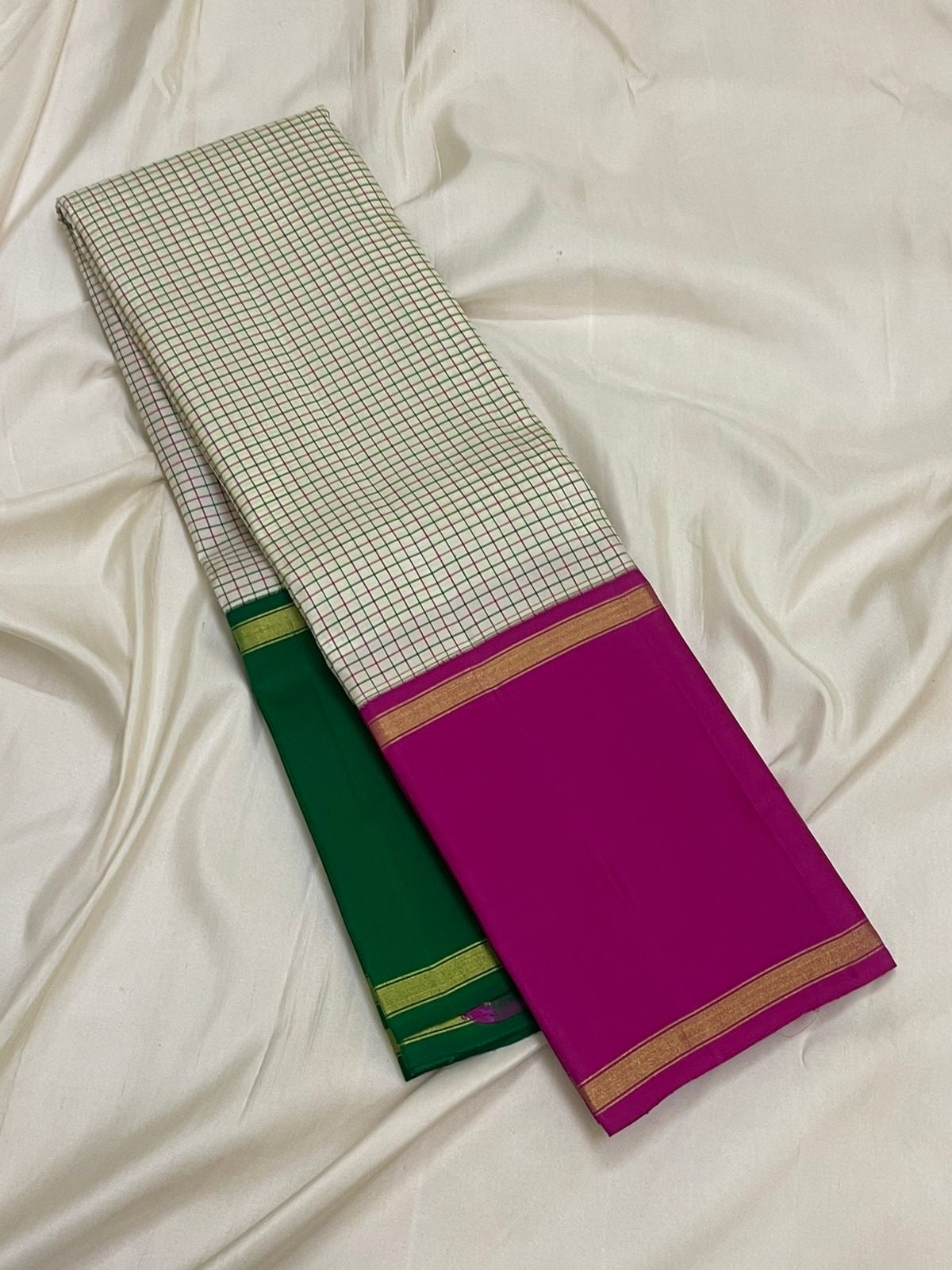 Cream white Kanchipuram silk saree with kanchi kattam checks folded view