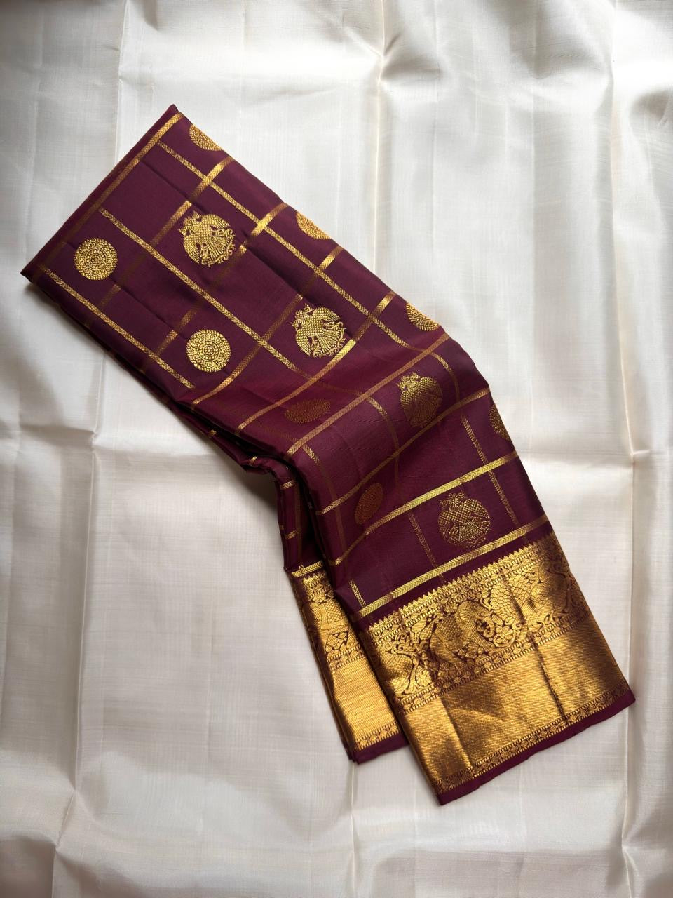 Kancheepuram silk saree plum body with gold check pattern detail