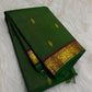 Yaanai (elephant) motif detail on maroon zari border, forest-green Kanchipuram saree