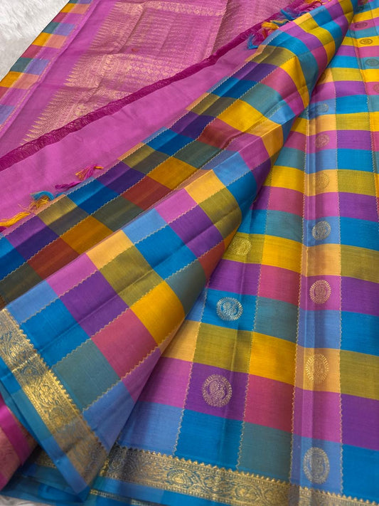 Kanjivaram silk saree yellow blue pink check pattern draped view