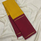 Saffron yellow Kanchipuram silk saree with kanchi kattam checks folded view