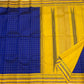 Border close-up of royal blue checked pure Kanchipuram silk saree with mustard yellow border and woven geometric bands