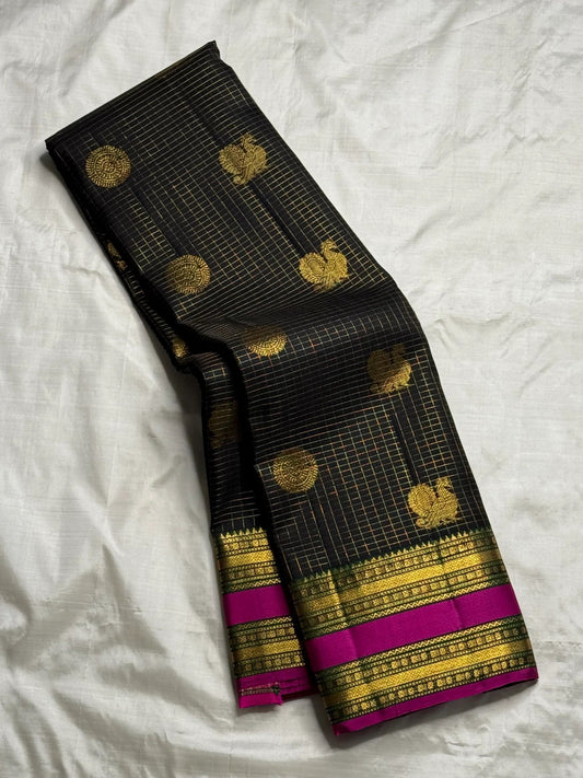 kanchipuram silk saree glowing black body zari kattam checks mayil butta motifs