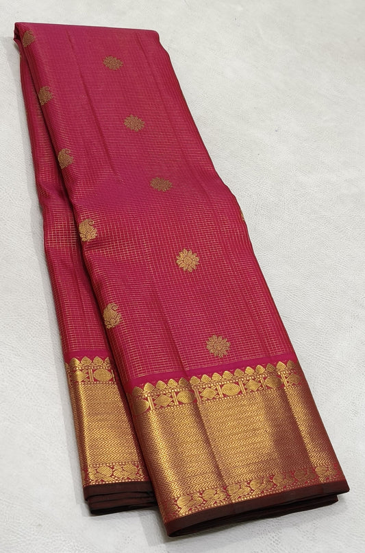 Pleasant pink Kanchipuram silk saree with zari kattam checks and antique gold zari border