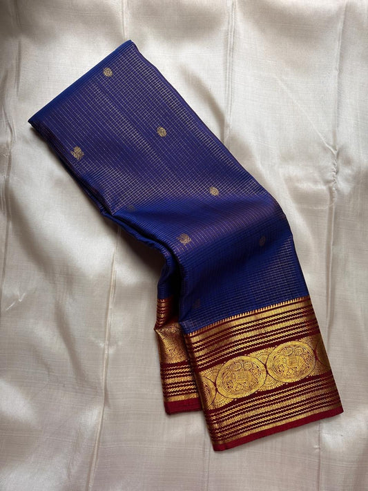 Sapphire blue Pure Kanchipuram silk saree with red border and classic gold zari kattam check pattern by Idam Living