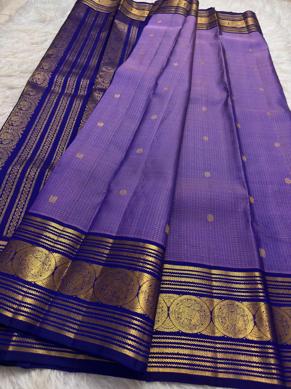 Lavender Oodha Kanchipuram Zari Kattam silk saree worn at a Srinivasa Kalyanam celebration in the USA