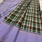 Mullai Lavender Kanchi Kattam Kanchipuram silk saree with gold zari bands, styled for a wedding rehearsal celebration.