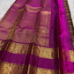 Oodha magenta Pure Kanchipuram Silk saree with Rettapet twin-band border worn at a wedding rehearsal celebration