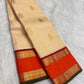 Sandalwood ivory handwoven pure silk Kanchipuram Kai Korvai saree with gold zari twin parrot buttas and raspberry-red border