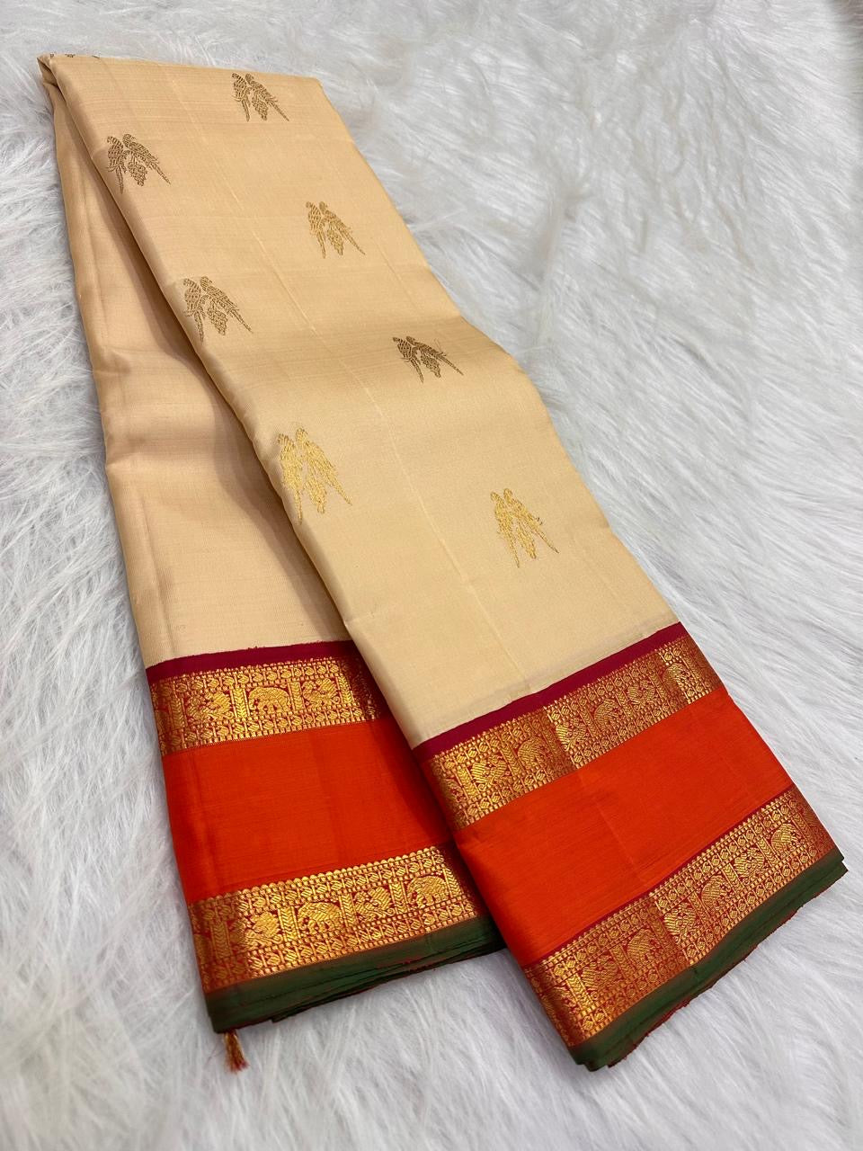 Sandalwood ivory handwoven pure silk Kanchipuram Kai Korvai saree with gold zari twin parrot buttas and raspberry-red border