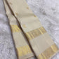 Stylized bird motifs in gold zari border on Warm Ivory Kanchipuram silk